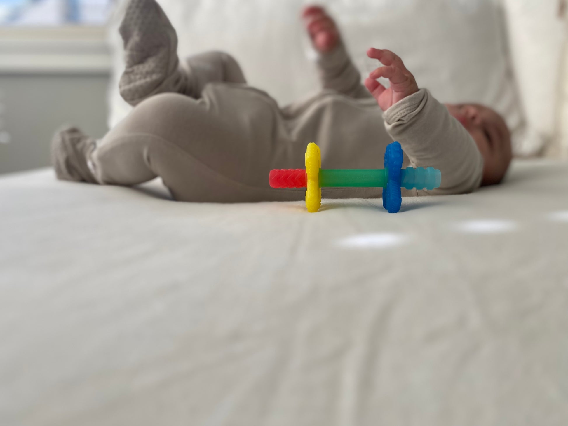 itzy ritzy teensy tube teether teething baby