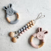Baby Jedbaby Silicone and wood bunny teether and pacifier clip in Tradewind