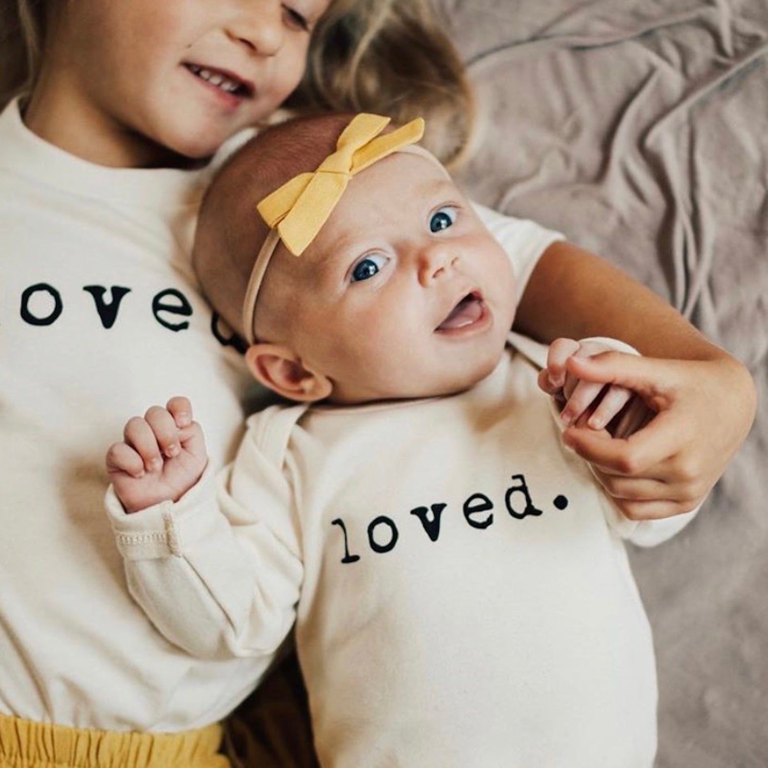 Baby Loved Long Sleeve Bodysuit. Made in USA from 100% GOTS certified organic cotton.