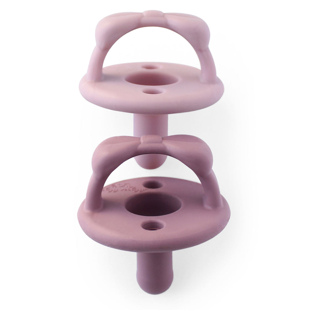 Newborn Infant Baby Itzy Ritzy 2pk Lilac Orchid Bows Sweetie Soother Pacifiers. Jedbaby