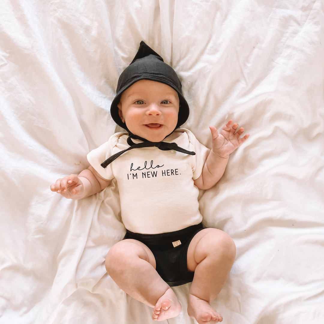 Baby Hello I'm New Here Organic Bodysuit Short Sleeve. Made in USA from 100% GOTS certified organic cotton.